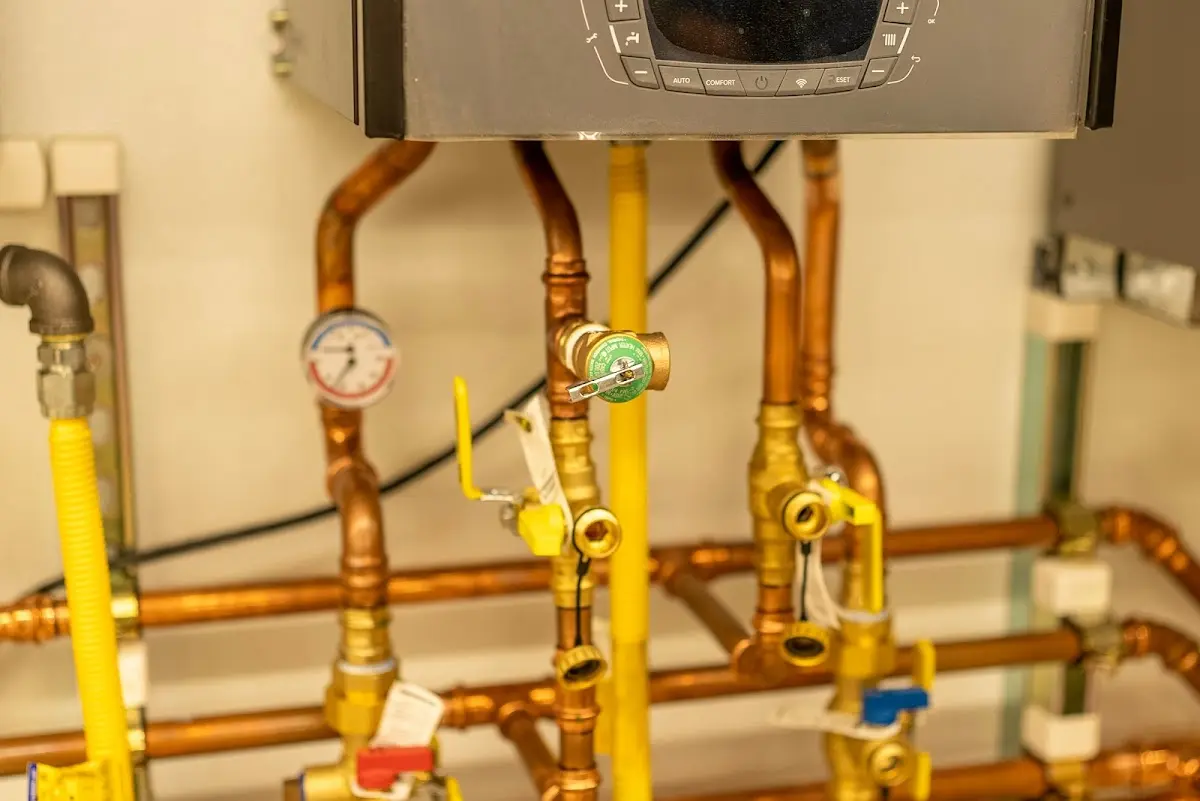 Licensed technician providing Water Heater Installation for a homeowner in Alma